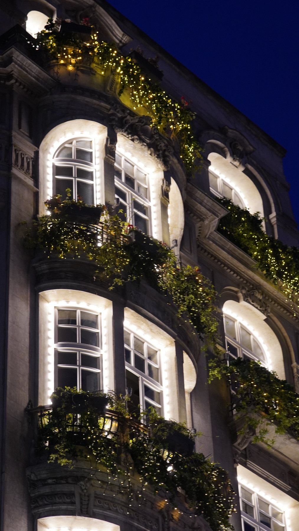 Lit building facade after dark