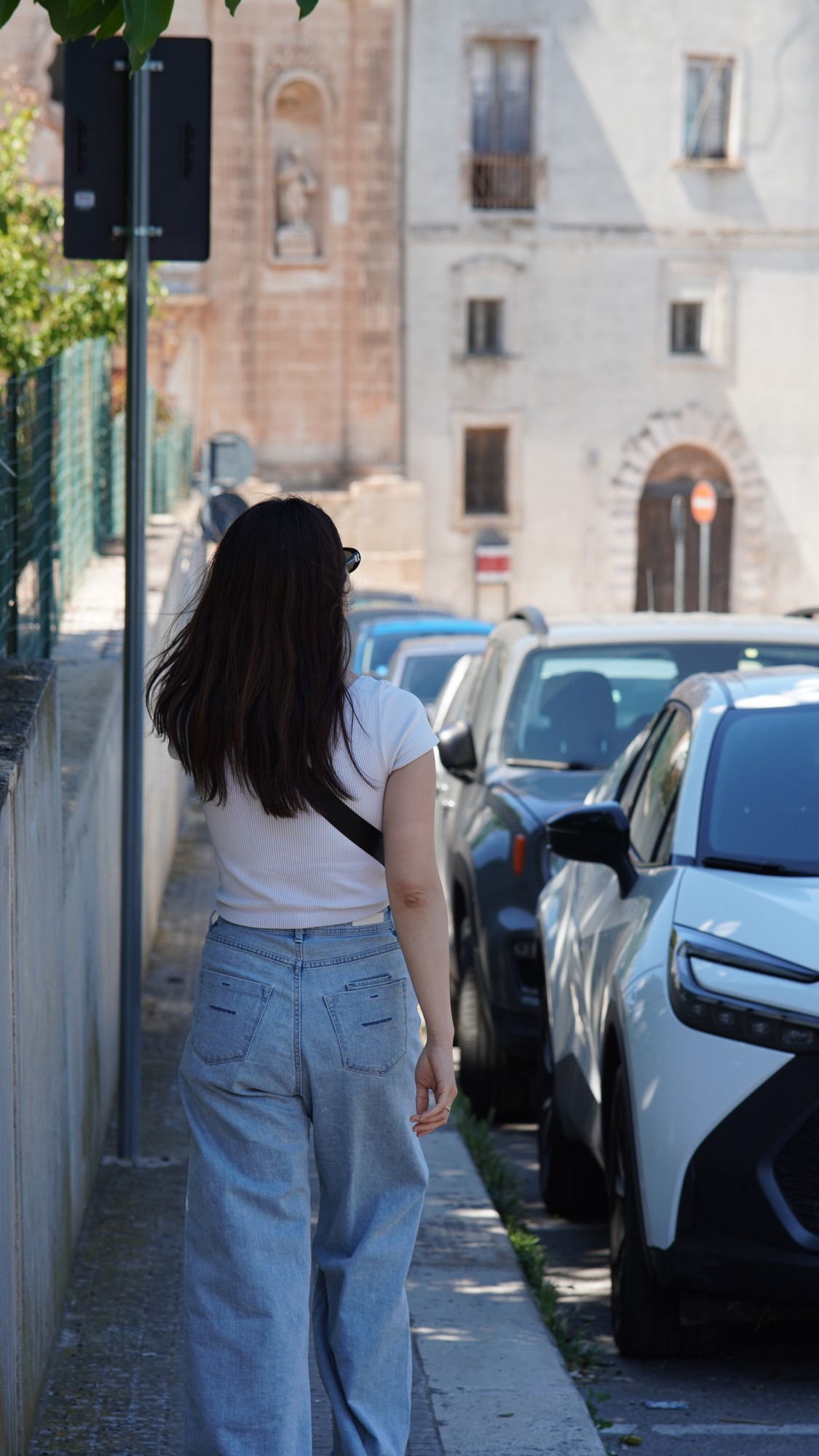 White street and passing cars