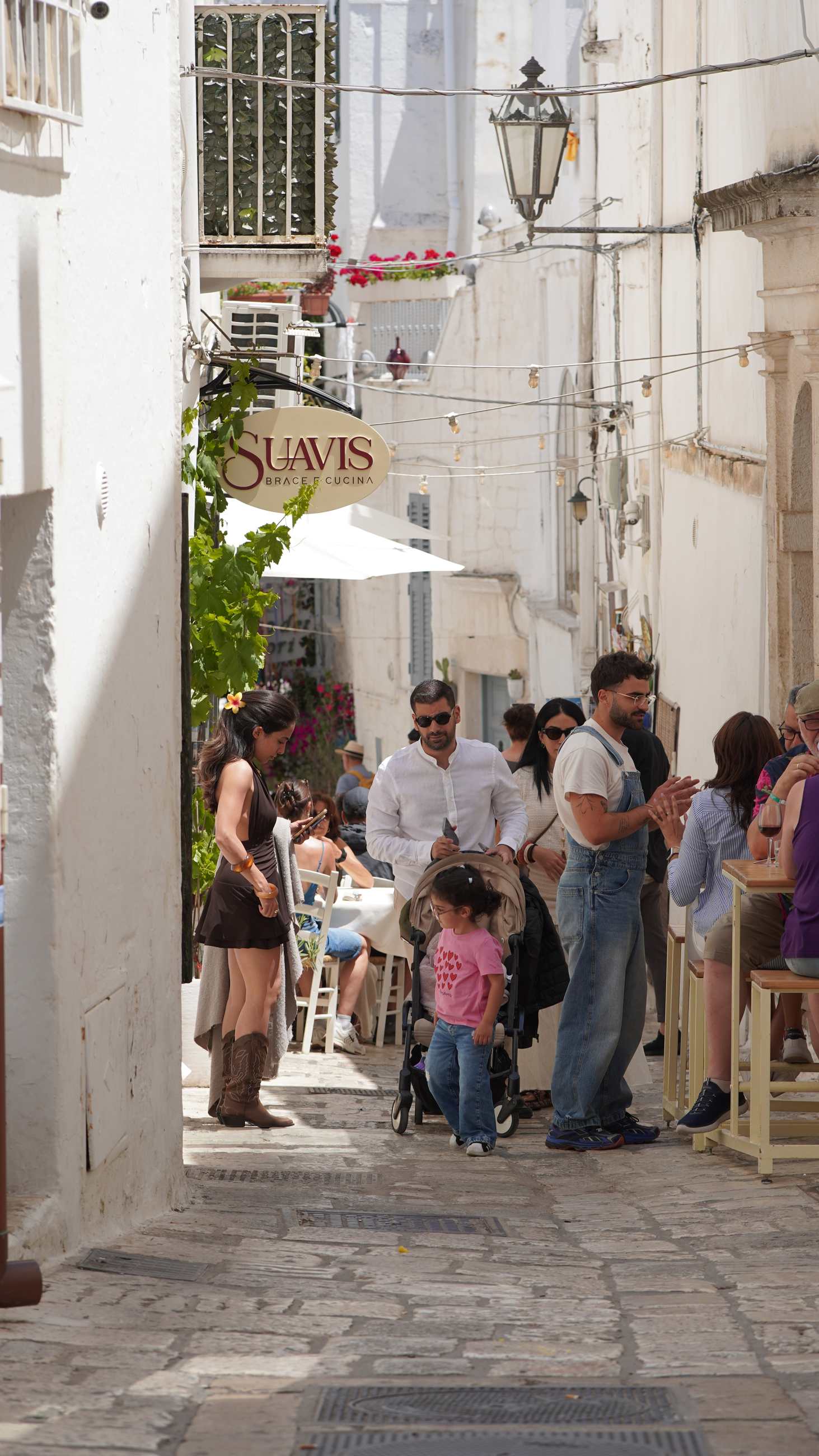 Crowd in a white Ostuni lane